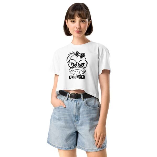 Woman wearing Unhinged crop top with angry cartoon duck and “Completely Unhinged” quote