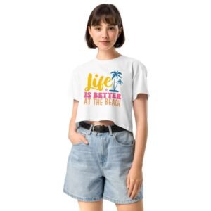 Woman wearing Beach Life crop top with palm tree and “Life Is Better at the Beach” design