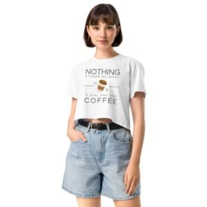 Woman wearing Fueled by Coffee crop top with bold quote about coffee