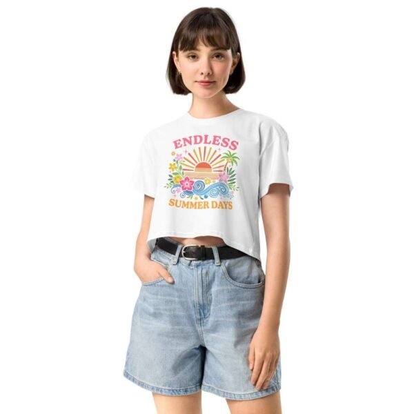 Woman wearing Endless Summer crop top with beachy palm tree and colorful wave design