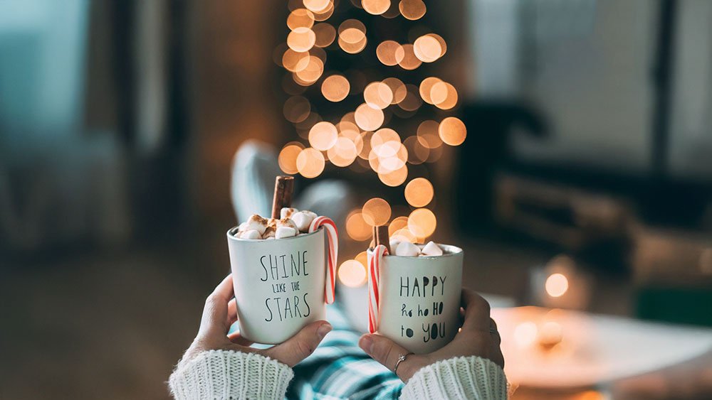 Mugs in woman hands