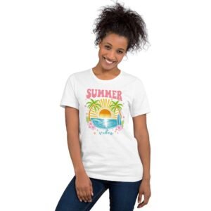 Woman wearing Tropical Vibes t-shirt with surfboard, palm trees, and colorful sunset